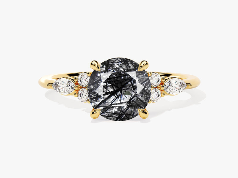Gold ring with oval rutilated quartz and diamonds