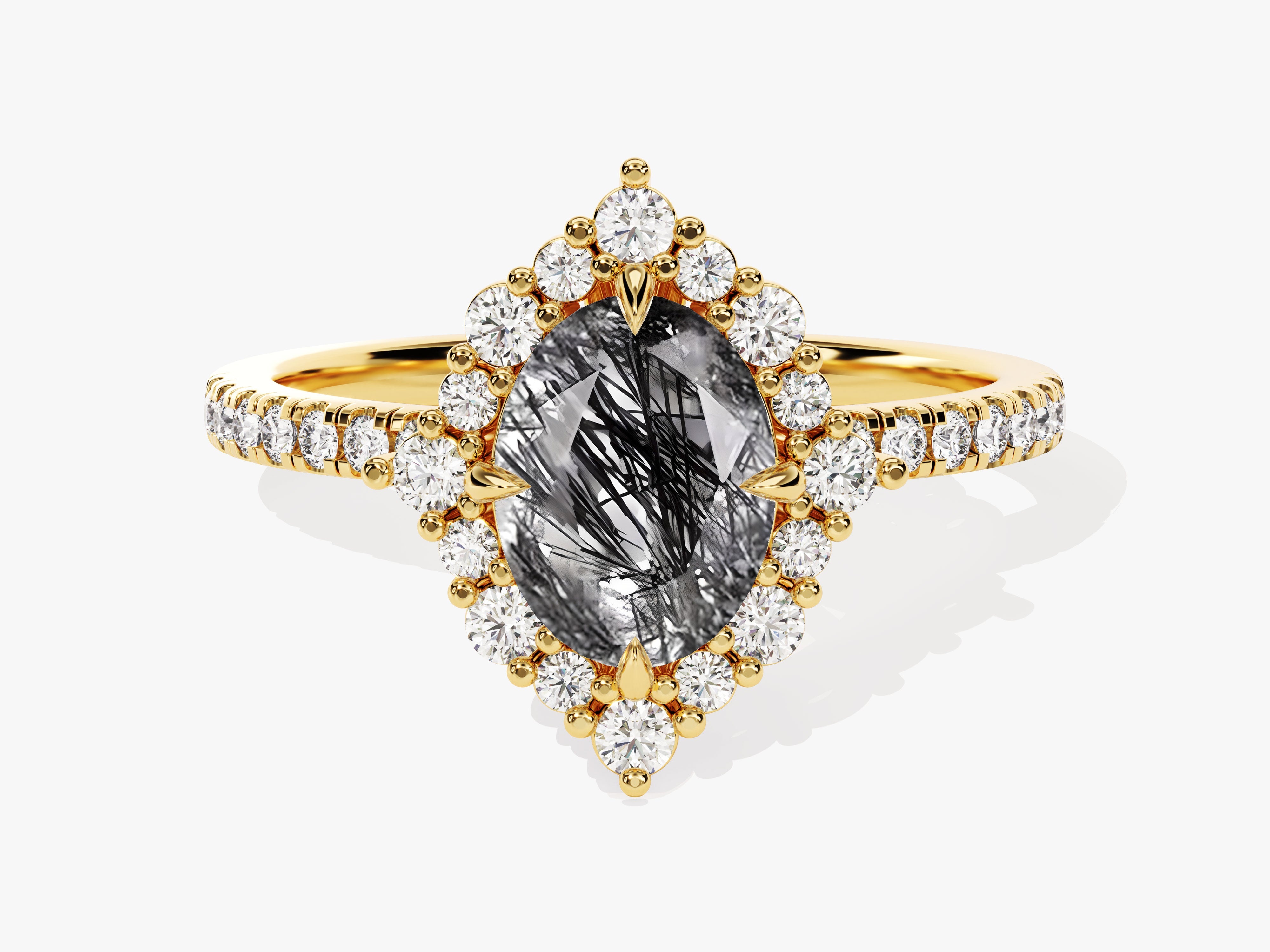 Gold ring with oval rutilated quartz and diamond halo