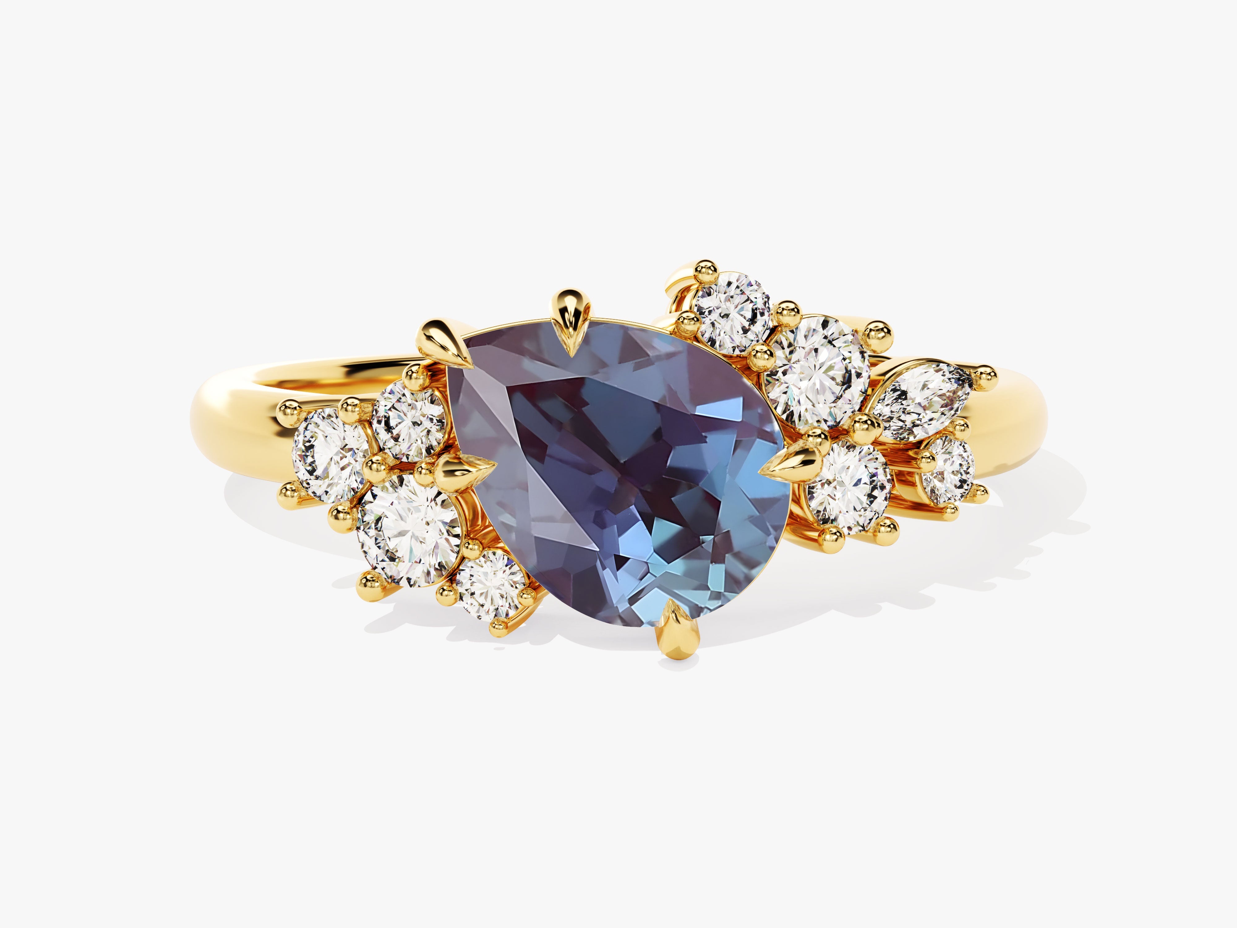 Gold ring with pear-shaped alexandrite and diamond accents